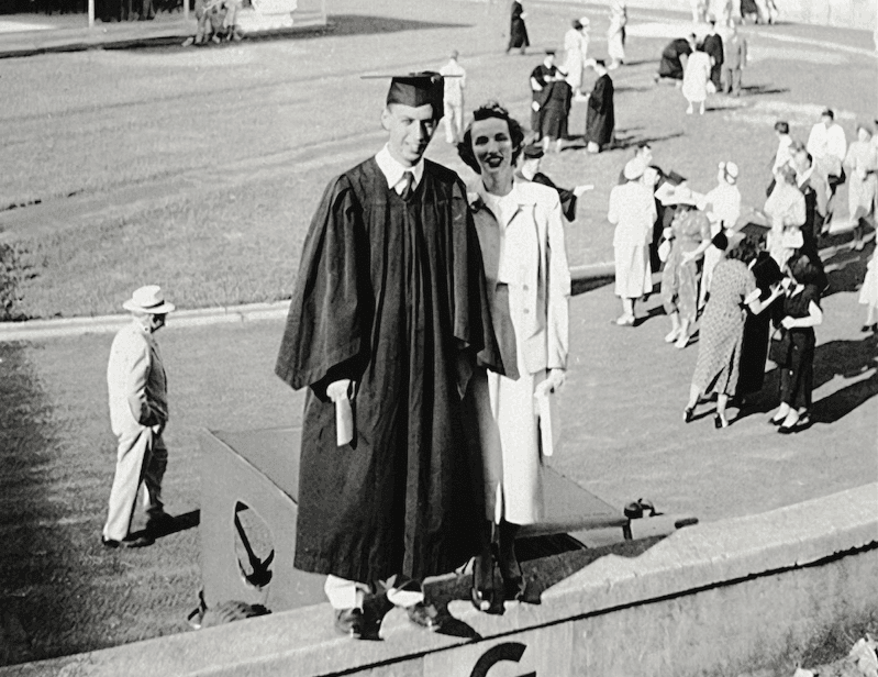 Black and white photo of a couple at high school graduation